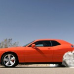 Profile, driver’s side, tires smoking, 2008 Dodge Challenger SRT8