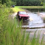 old truck in pond